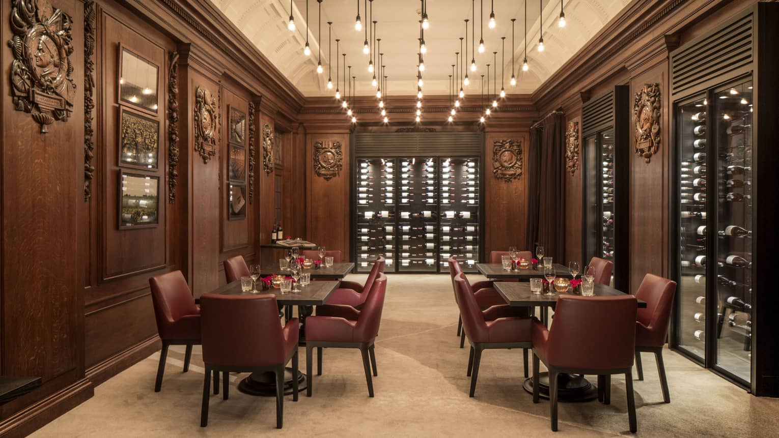 Château Latour's 3 Wine Categories features a long, elegant room with rich dark wood paneling.