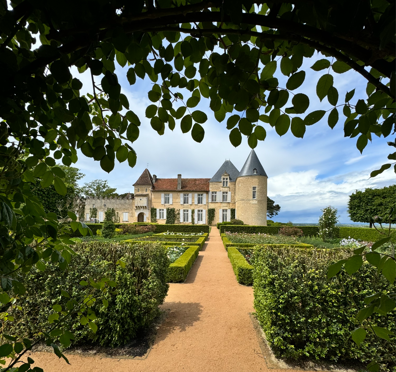 a chateau with a garden
