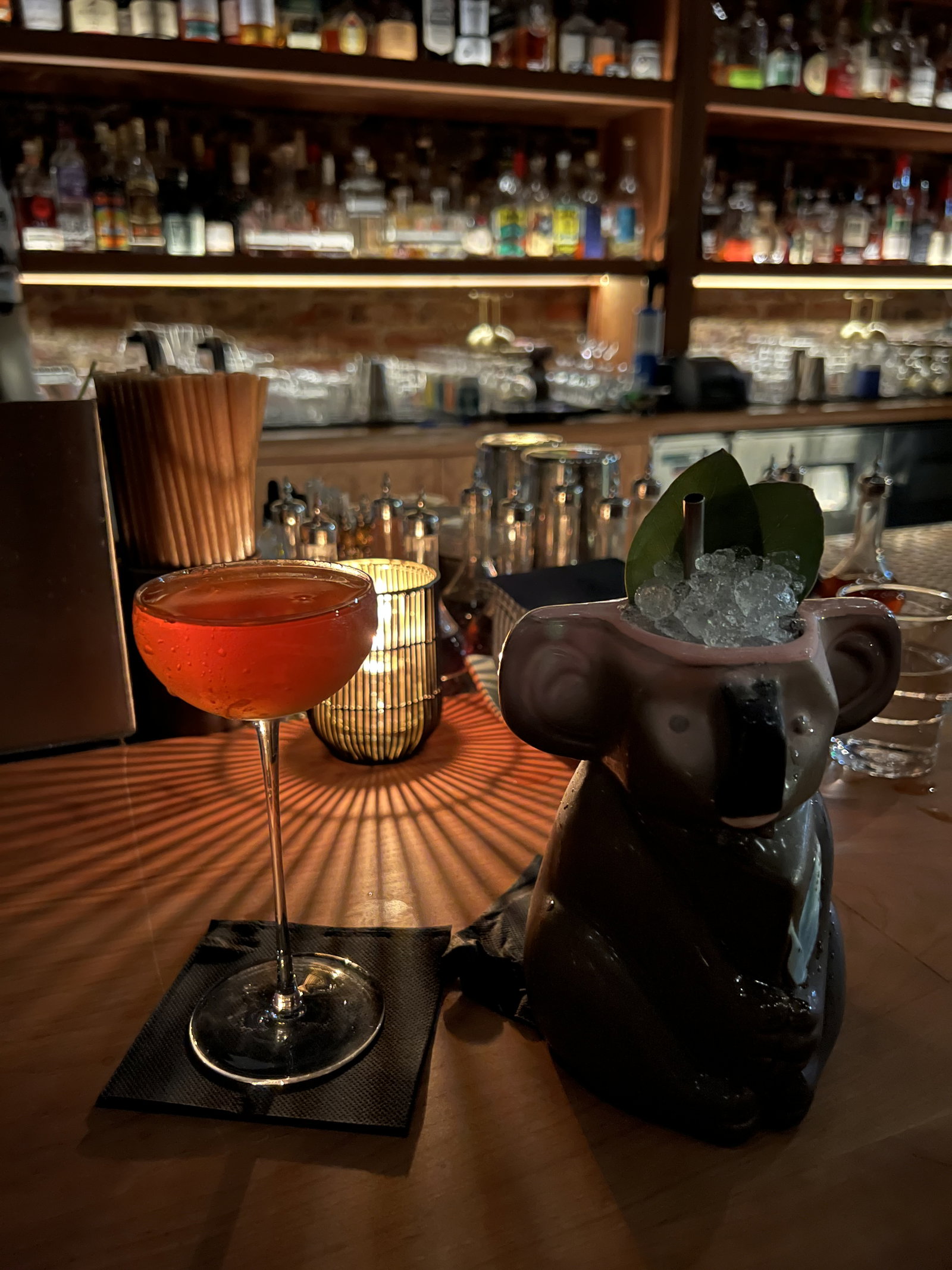 two cocktails on a bar