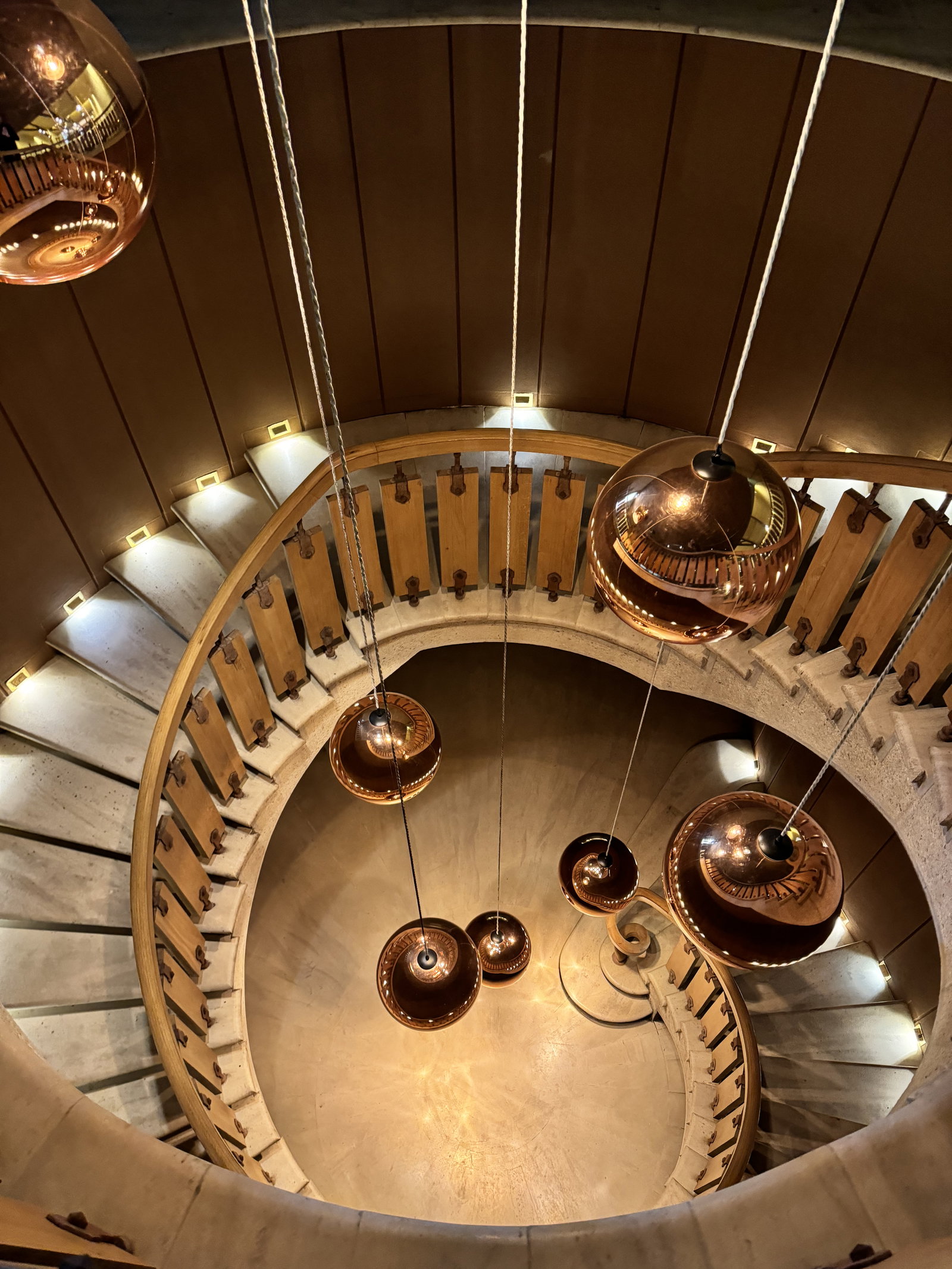 a stairway with hanging lights