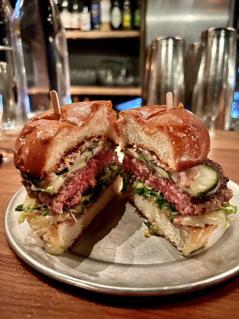 a burger on a bar