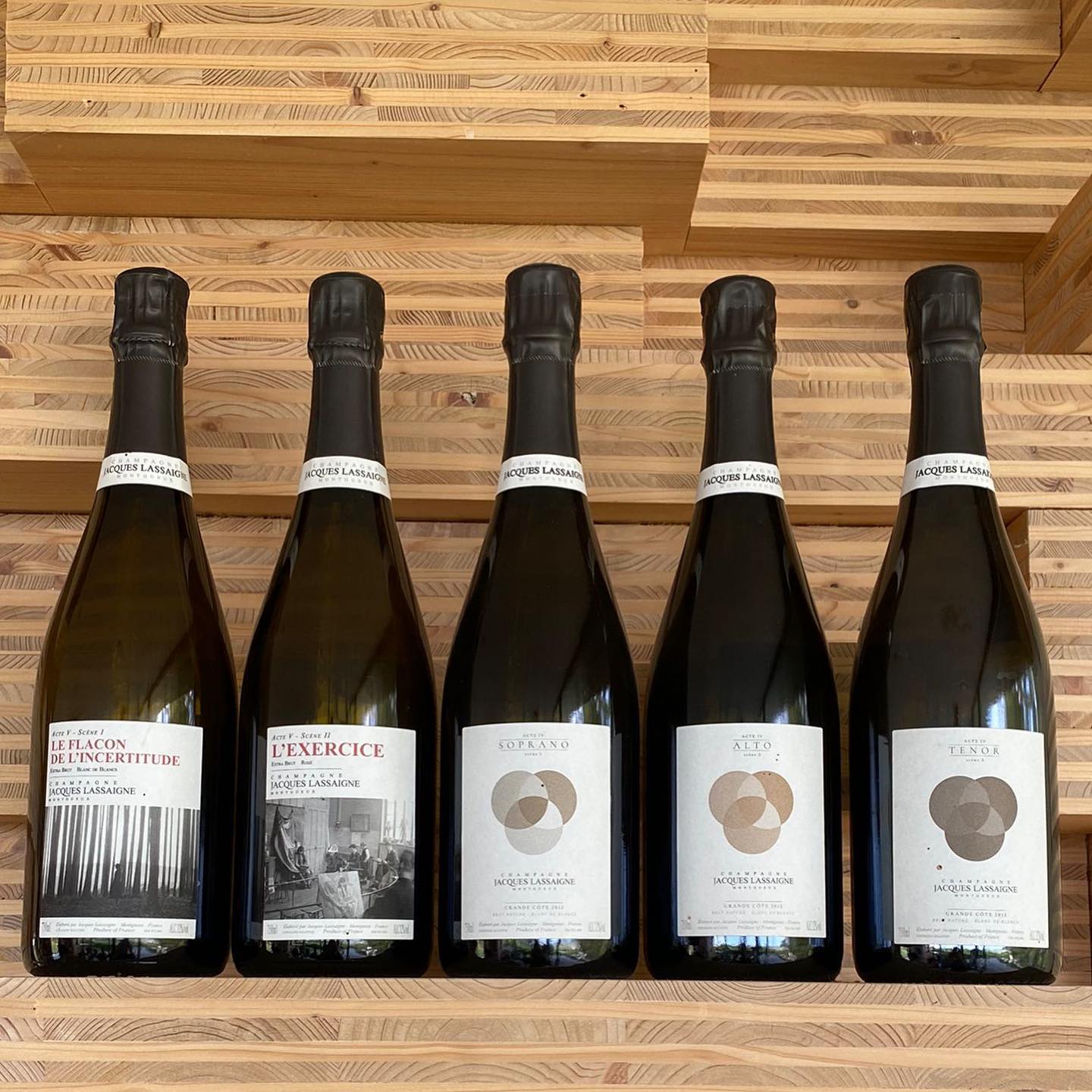 A lineup of Jacques Lassaigne's Wines