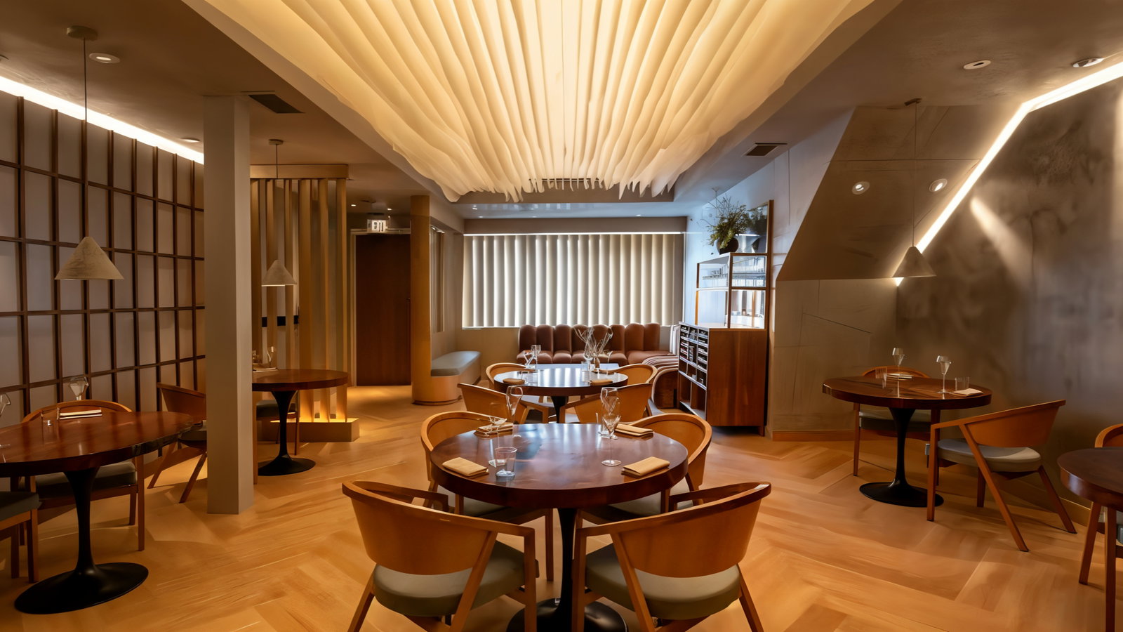 Modern restaurant interior, wooden tables and chairs, warm lighting, wave-like ceiling, minimalist decor, set for dining. Cozy ambiance.