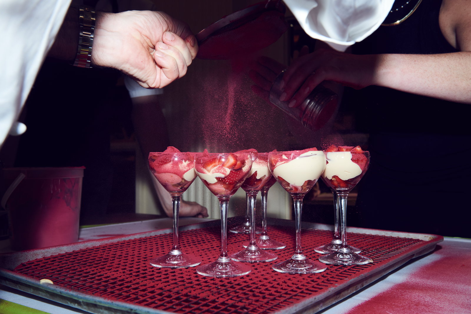 strawberry dessert inside of a wine glass