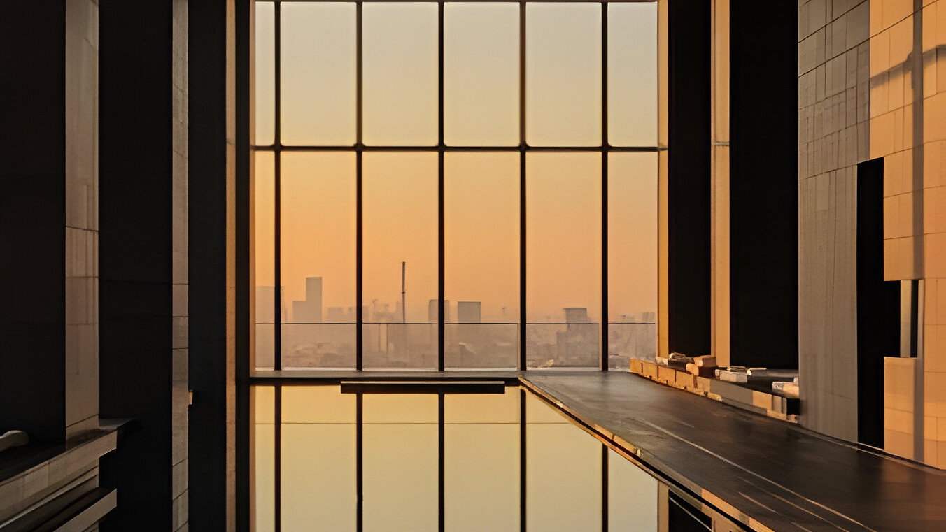 Indoor pool area with large windows showcasing a sunset cityscape. Warm colors, modern architecture, tranquil and spacious ambiance.