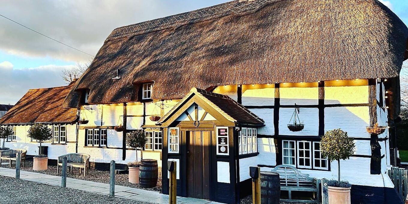 The Bottle & Glass Inn bar in Binfield Heath, United Kingdom