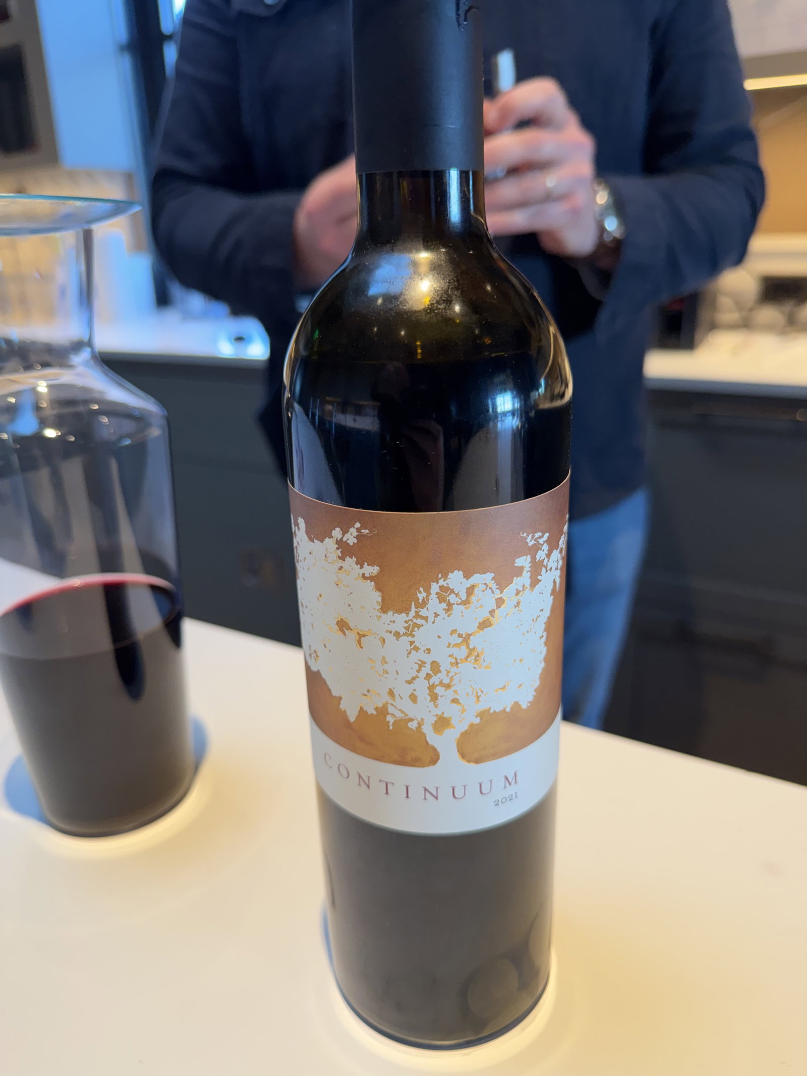 Bottle of 2021 Continuum Estate wine during the tasting