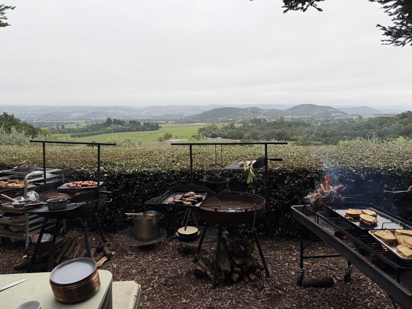 Open-fire breakfast setup overlooking Napa Valley at The Mascot Dawn Patrol