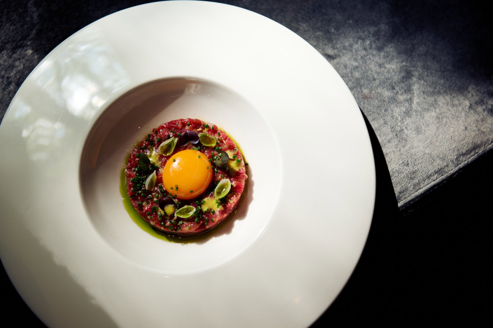 A plated British brasserie dish at The Hyde at Roseate House London