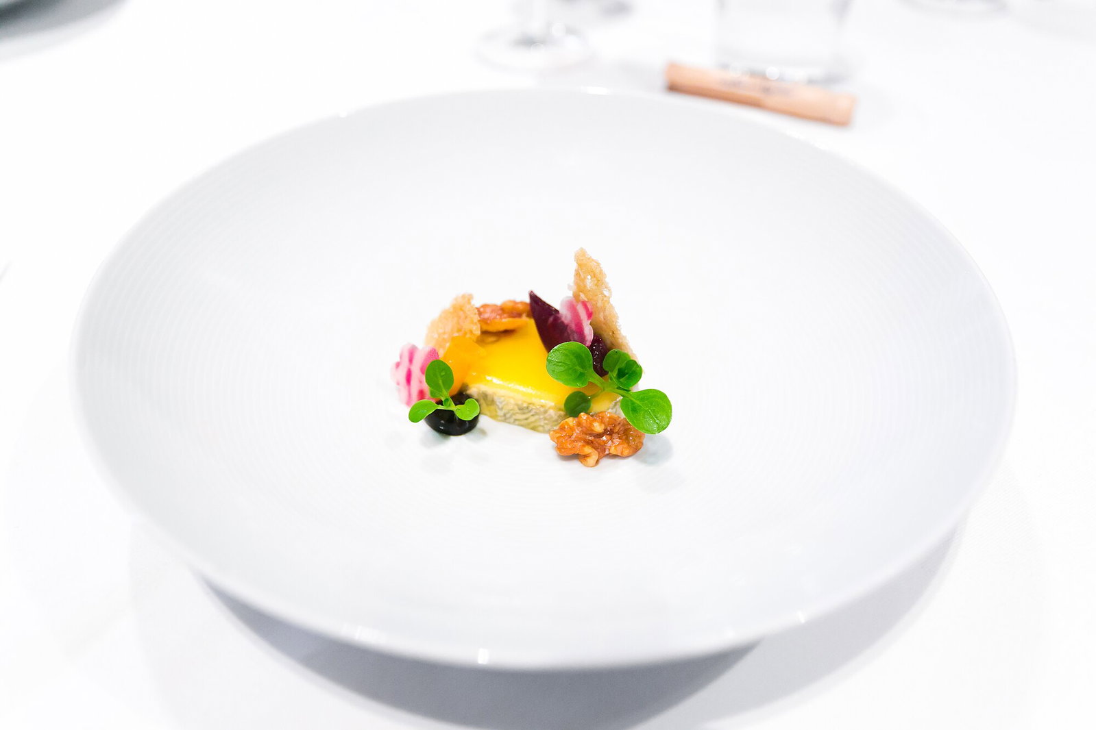 A plated Elysian Fields Farm lamb saddle dish