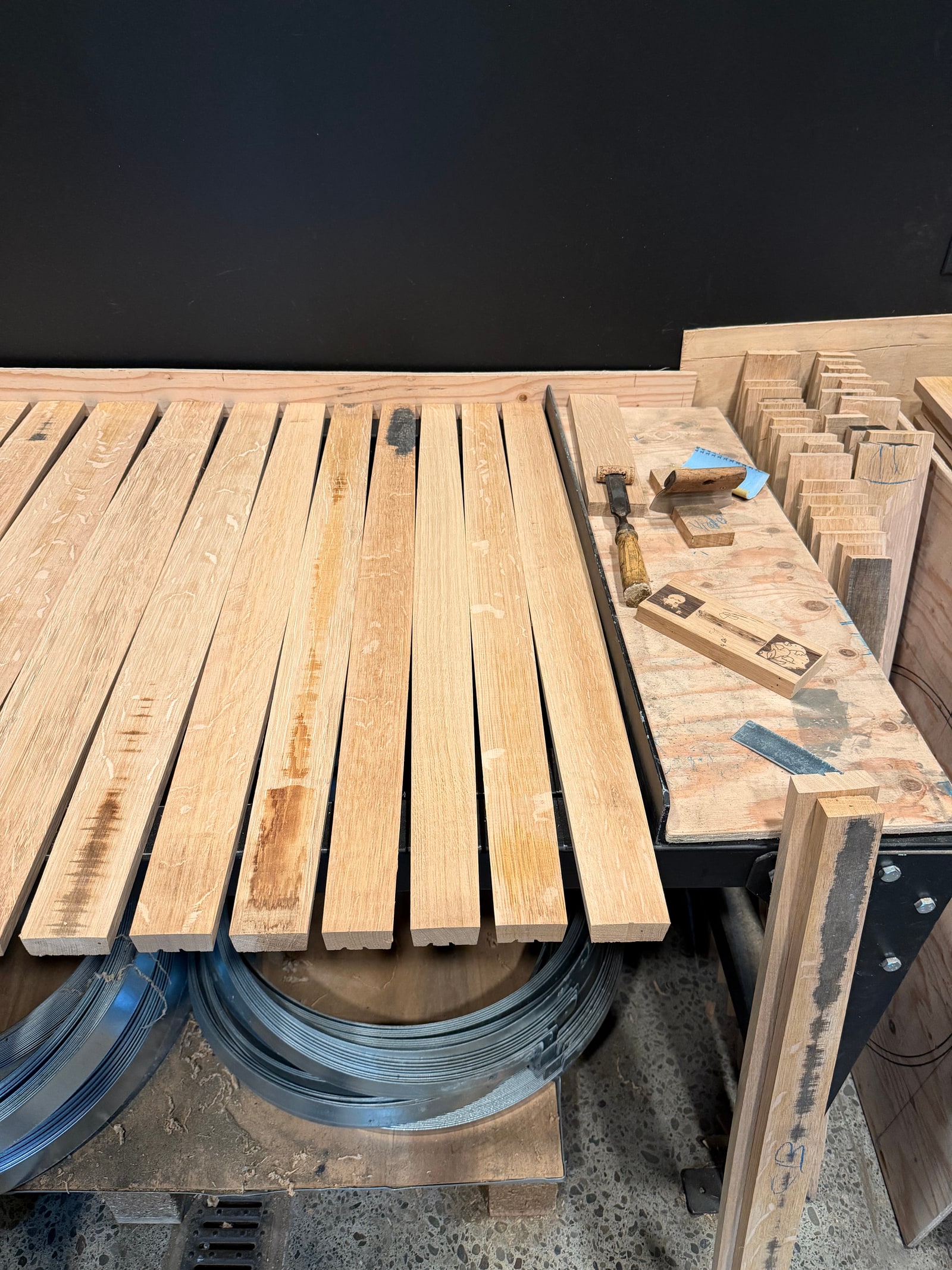 Oak staves and cooperage tools inside Cathiard Vineyard barrel workshop